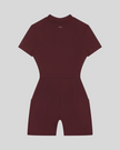 MotionFlow Romper in Wine Red back view showcasing the sculpted silhouette and bermuda-length shorts