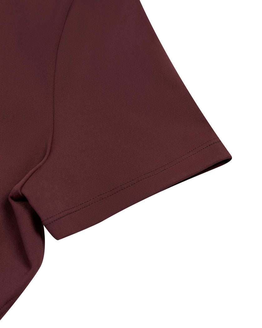 Close-up of the short sleeve construction on the MotionFlow Romper in Wine Red