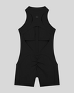 MotionFlow Yoga Romper in Black back view showcasing the open racerback design and sculpting fit