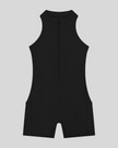 MotionFlow Yoga Romper in Black front view featuring a mock neck, quarter-zip front, and above-the-knee silhouette