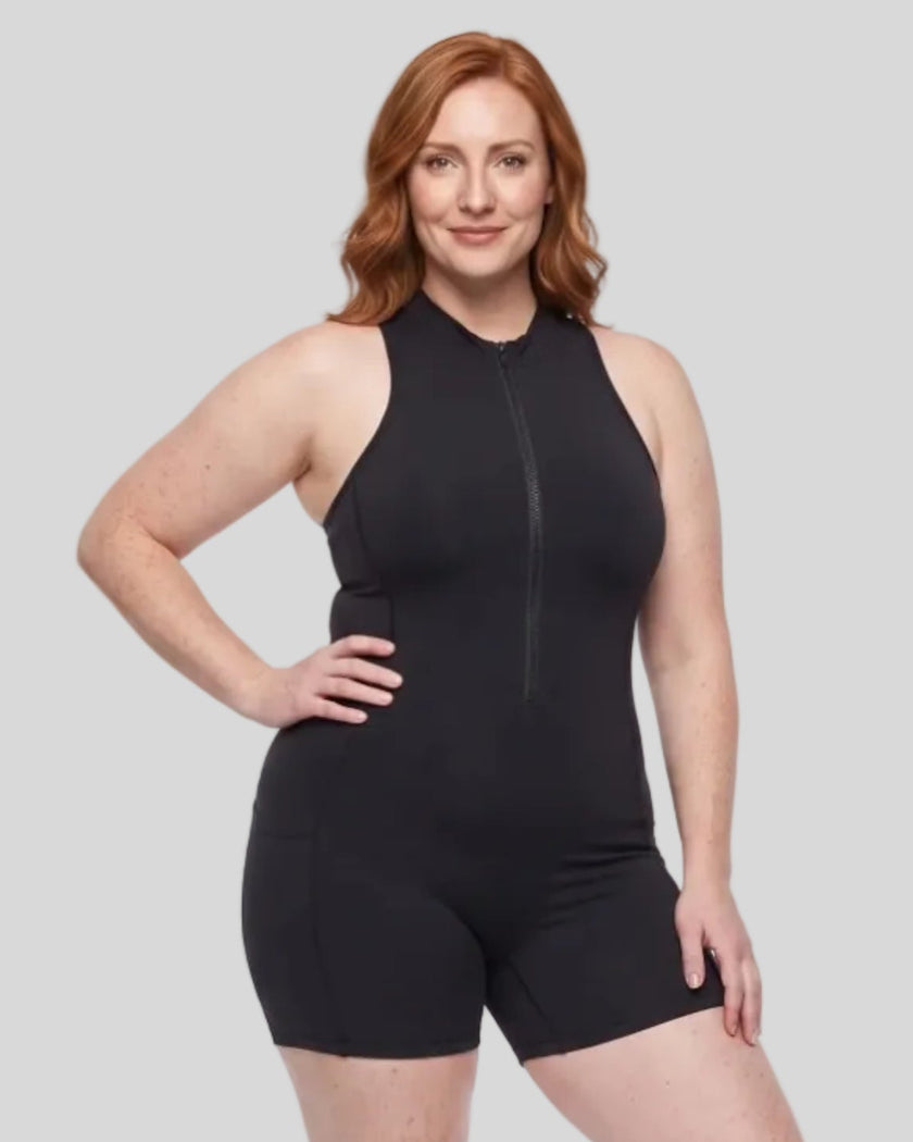 Model wearing the MotionFlow Yoga Romper in Black viewed from the front