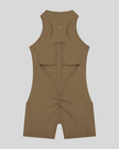 MotionFlow Yoga Romper in Coffee back view showcasing the open racerback design and sculpting fit
