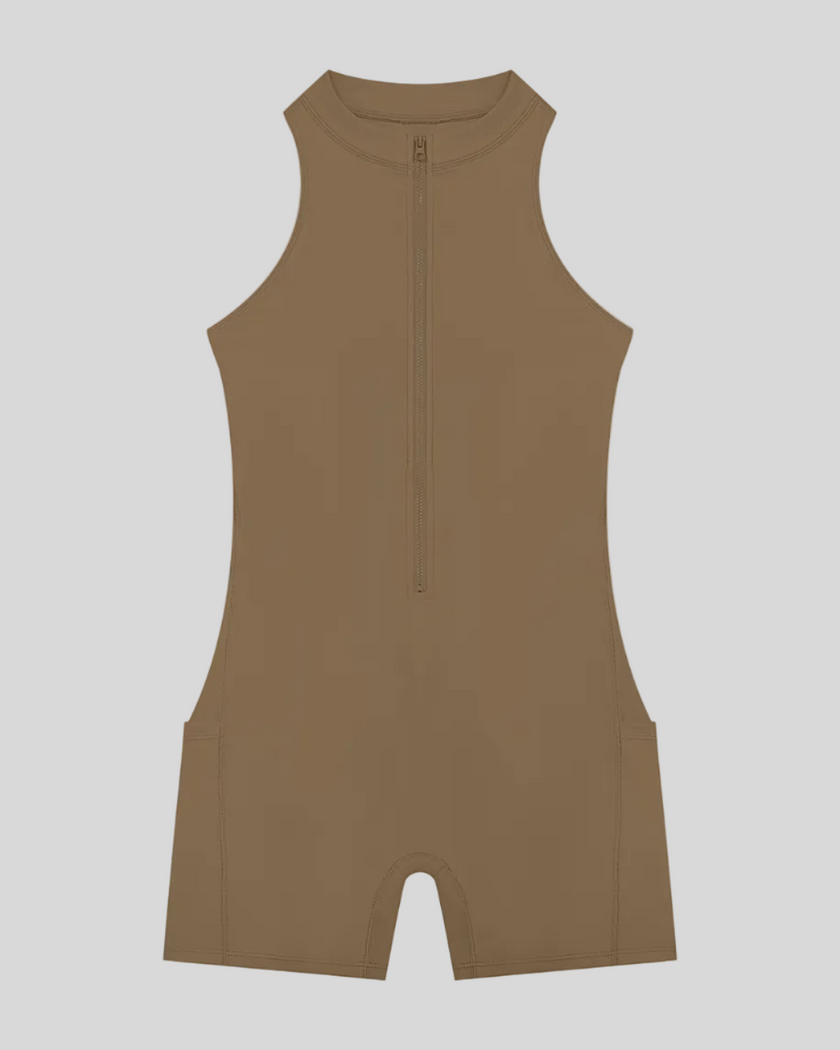 MotionFlow Yoga Romper in Coffee front view featuring a mock neck, quarter-zip front, and above-the-knee silhouette