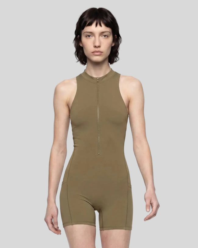 Model wearing the MotionFlow Yoga Romper in Coffee viewed from the front