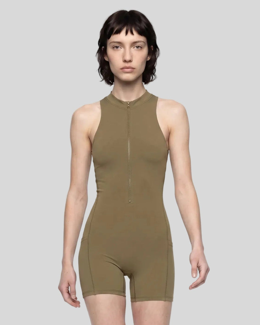 Model wearing the MotionFlow Yoga Romper in Coffee viewed from the front