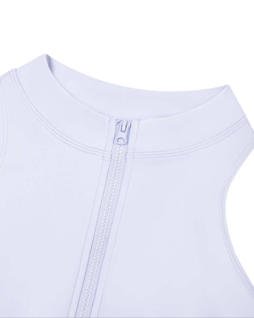 Close-up of the mock neckline and quarter-zip closure on the MotionFlow Yoga Romper in Purple