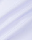 Close-up of the smooth stretch performance fabric used on the MotionFlow Yoga Romper in Purple