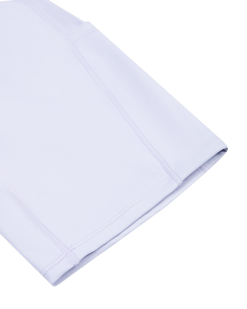 Close-up of the above-the-knee leg hem on the MotionFlow Yoga Romper in Purple