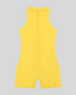 MotionFlow Yoga Romper in Yellow front view featuring a mock neck, quarter-zip front, and above-the-knee silhouette
