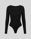 Athlesi MotionForm Long Sleeve Bodysuit in Black, front view showing the U-neckline and fitted long sleeve silhouette