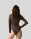 Model wearing the Athlesi MotionForm Long Sleeve Bodysuit in Coffee, back view highlighting the smooth fitted silhouette