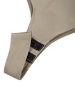 Close-up of the bottom snap closure on the Athlesi MotionForm Long Sleeve Bodysuit in Khaki