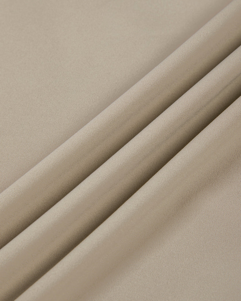 Close-up of the smooth stretch nylon fabric of the Athlesi MotionForm Long Sleeve Bodysuit in Khaki