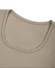 Front neckline close-up of the Athlesi MotionForm Long Sleeve Bodysuit in Khaki showing the softly curved U-neck.
