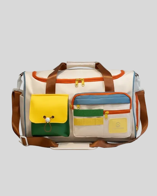 MotionPlay Travel Bag in beige studio shot with color block design and multiple pocket