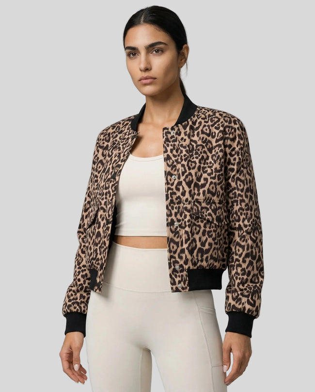 MotionSnap Bomber Jacket Signature in brown leopard worn by model mid body front view highlighting fit and details