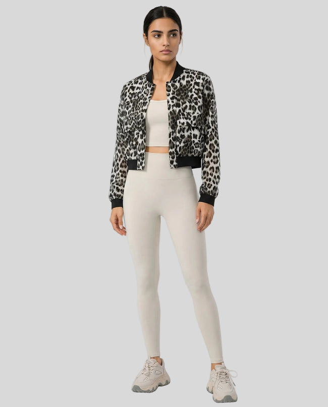 MotionSnap Bomber Jacket Signature in dark gray leopard worn by model full body front view styled in a modern studio setting
