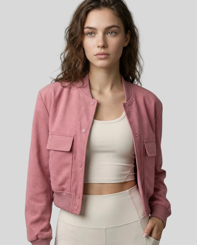 MotionSnap Bomber Jacket Signature in dusty pink worn by model mid body front view highlighting fit and details