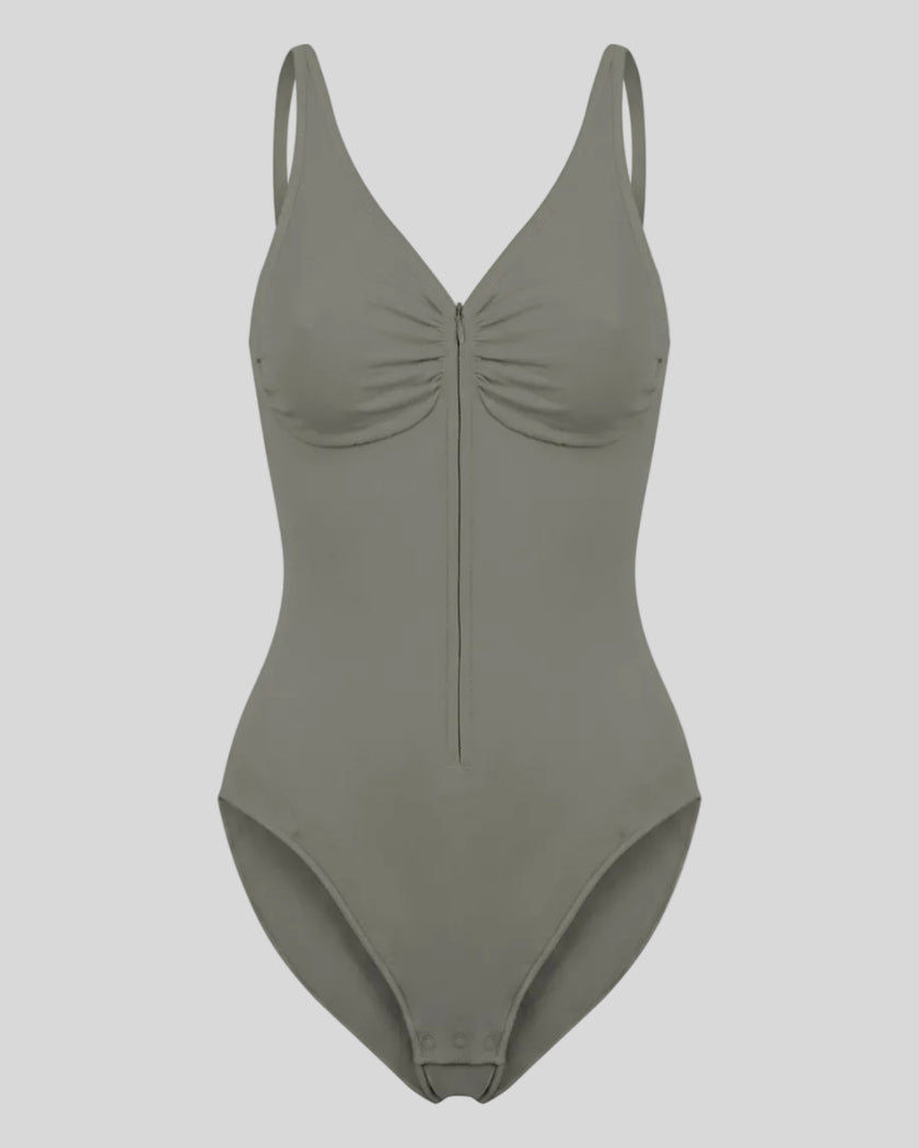 MotionZip Ruched Bodysuit in Gray front view with ruched bust, adjustable straps and front zipper