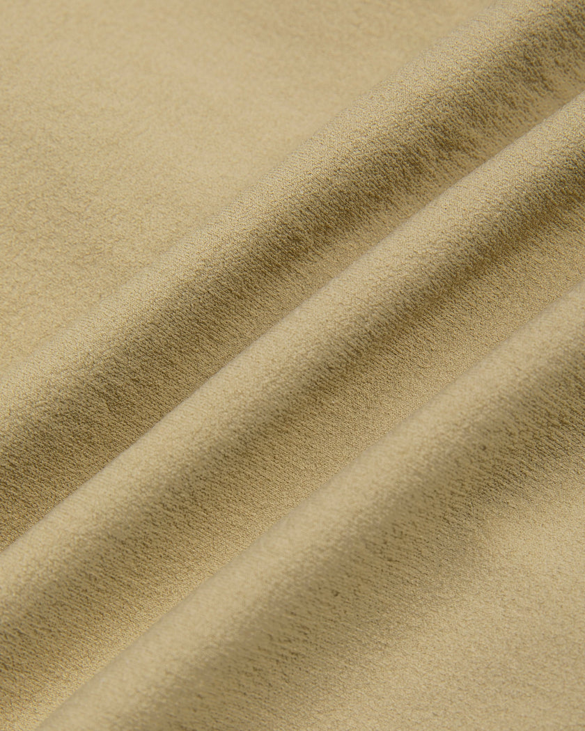 Close-up of Khaki stretch nylon-blend fabric on the MotionZip Ruched Bodysuit