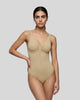 Woman wearing the MotionZip Ruched Bodysuit in Khaki, shown from the front with its fitted silhouette and ruched bust
