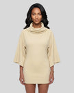 Mid body front view of a woman modeling apricot Muse Cowl Neck Tunic with wide three-quarter sleeves