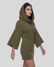 A woman modeling an army green hooded Muse Cowl Tunic dress with wide three-quarter sleeves