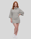 Full body front view of woman styled in Muse Cowl Tunic in flower gray