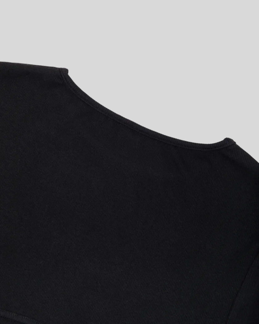 Closeup of back neckline and open-back construction on Nova Tie-Back Tee