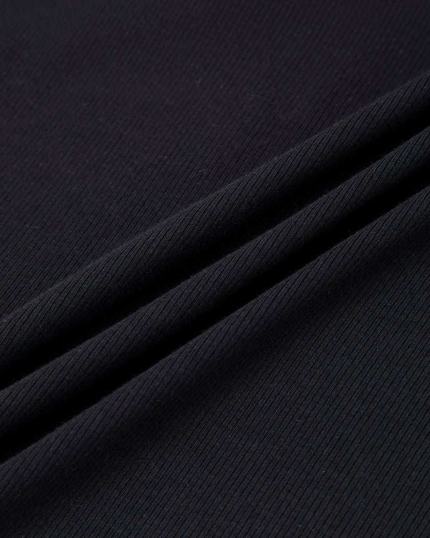 Closeup of soft black cotton-viscose stretch knit fabric on Nova Tie-Back Tee