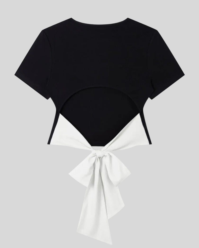Back view of Nova Tie-Back Tee in black featuring an open back and contrasting White bow
