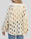 Open-weave cable knit sweater in beige with relaxed fit, back view