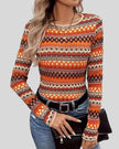 Front view of Athlesi PatternPulse Long Sleeve Top in orange patterned design