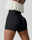 Back left view of black seamless high-waist short with rear pocket