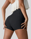 Back right view of black seamless studio short with waistband pocket
