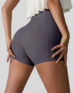 Back right view of charcoal seamless studio short with waistband pocket