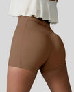 Back left view of chestnut seamless high-waist short with rear pocket