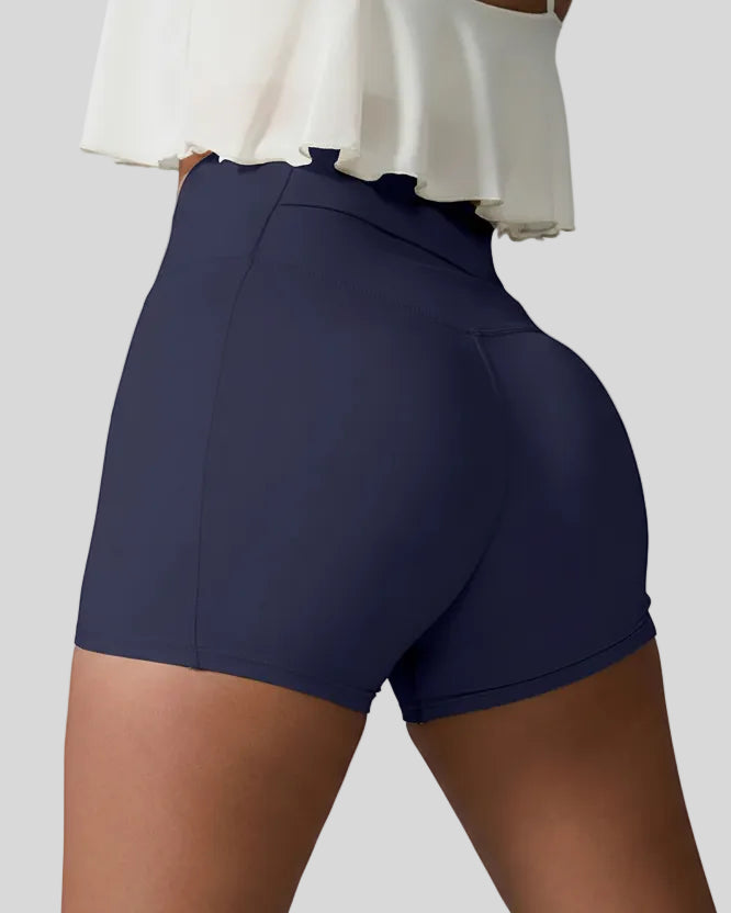 Back left view of navy seamless high-waist short with rear pocket