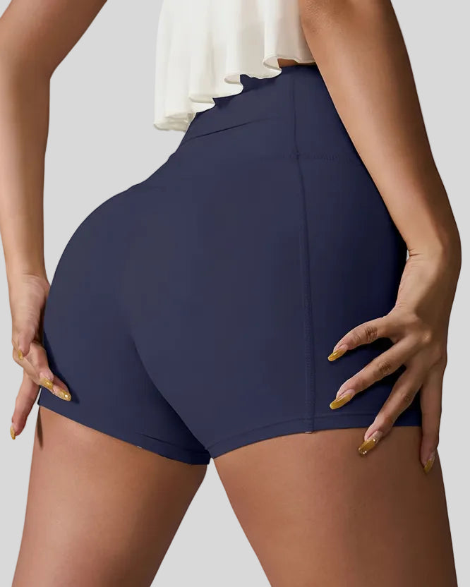 Back right view of navy seamless studio short with waistband pocket