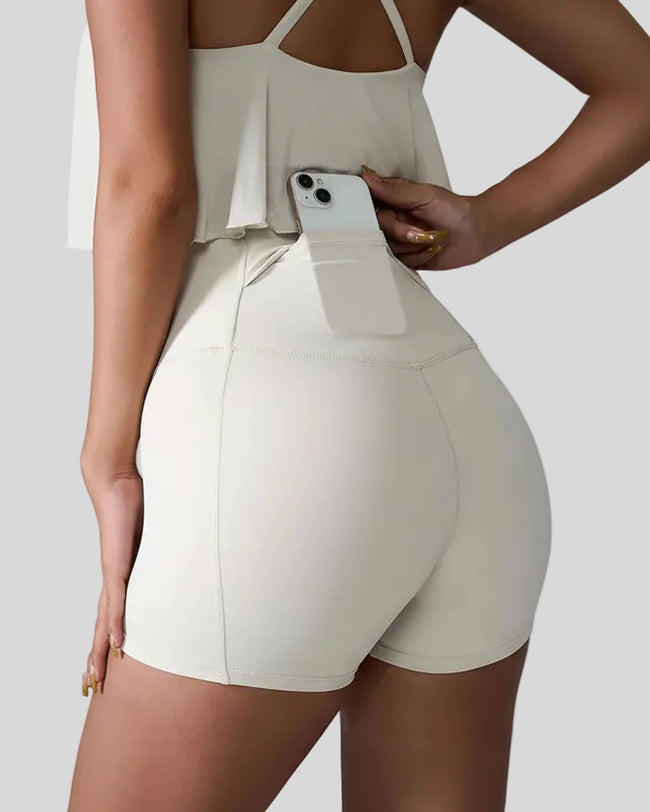 Back left view of white seamless high-waist short with rear pocket