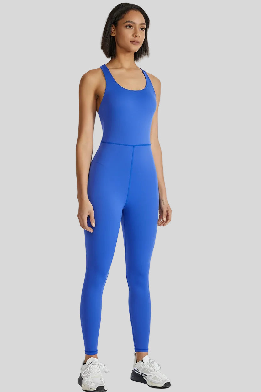 Front angle view of Athlesi PowerFlow open-back active jumpsuit in blue