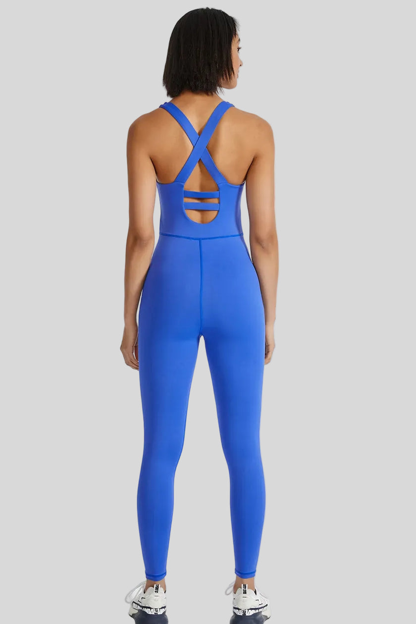 Back view of Athlesi PowerFlow open-back active jumpsuit showing crisscross strap design in blue