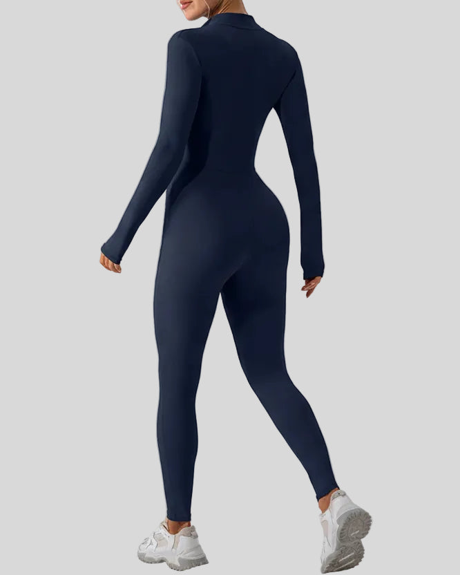 Back view of Athlesi PowerSculpt half-zip long sleeve jumpsuit in dark blue