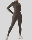 Front angle view of Athlesi PowerSculpt active jumpsuit in dark gray