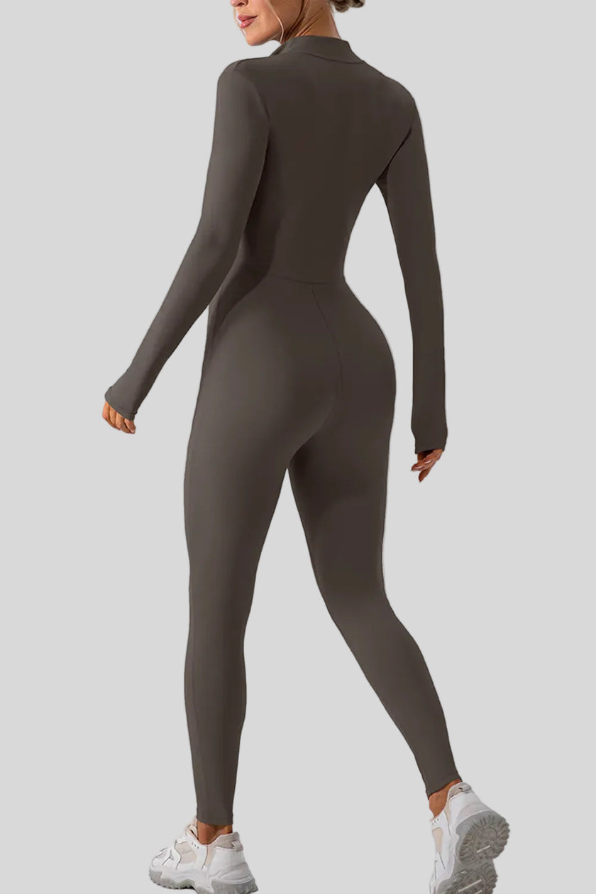 Back view of Athlesi PowerSculpt half-zip long sleeve jumpsuit in dark gray