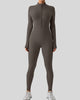 Athlesi PowerSculpt long sleeve active jumpsuit in dark gray, front view