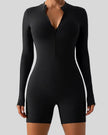 Athlesi PowerSculpt long sleeve romper in black, front view