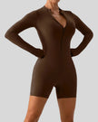 Front angle view of Athlesi PowerSculpt long sleeve romper in chocolate