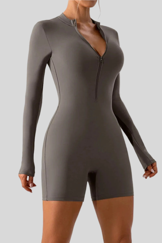 Front angle view of Athlesi PowerSculpt long sleeve romper in dark gray