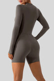 Back view of Athlesi PowerSculpt long sleeve romper in dark gray